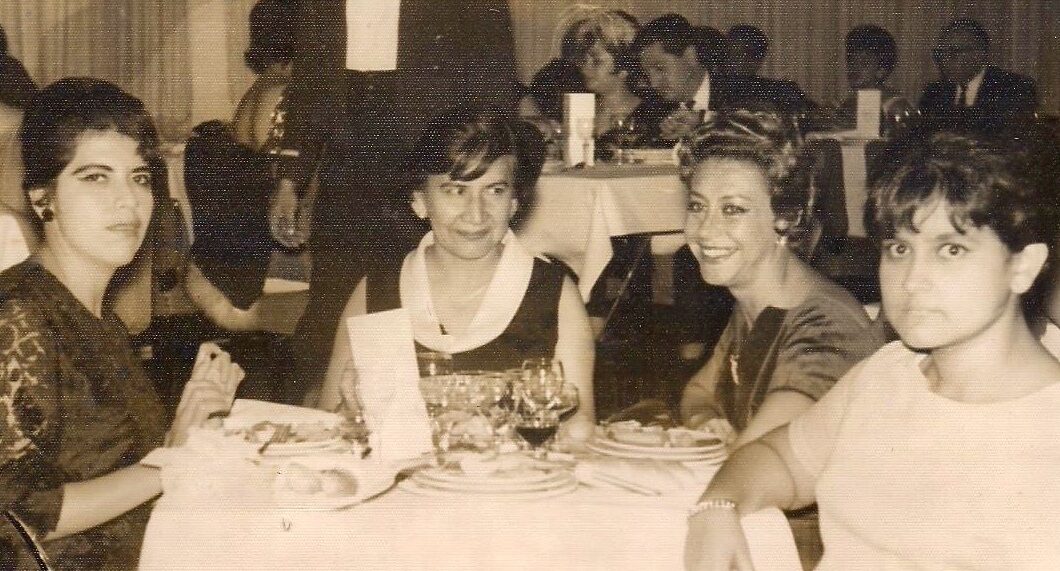 Elisa, second from left, with friends and family circa 1960s.